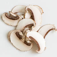 en geschnittene champignons