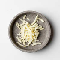 junger gouda, gerieben