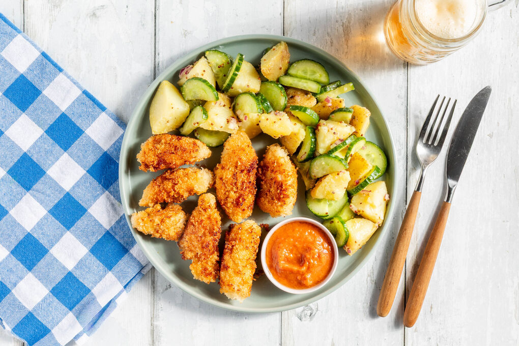 Knusprige Hähnchennuggets mit Tomatensalsa und Kartoffelsalat