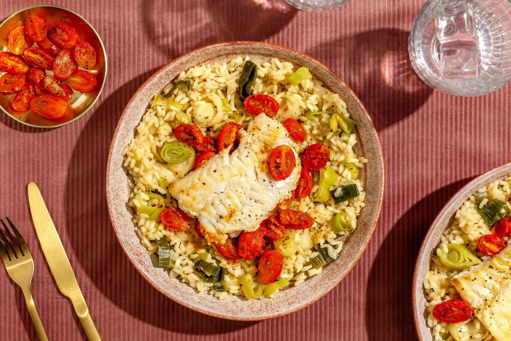 Feines Kabeljaufilet an Risotto mit gebackenen Kirschtomaten